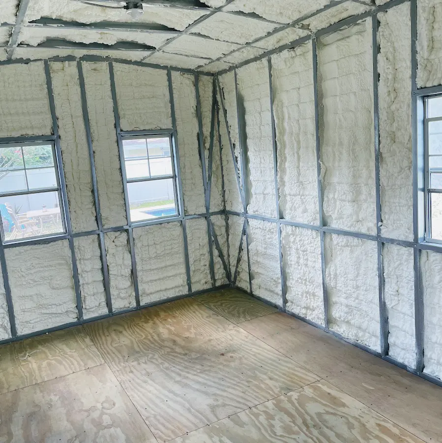 Closed-cell spray foam insulation applied to wall cavities in a residential project in Stallings